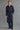 {"id":8453955715222,"title":"Navy Unlined Cashmere Dressing Gown","handle":"unlined-cashmere-gown-navy","description":"\u003cp\u003e\u003cspan\u003eAn essential piece from our core collection of bold block-coloured cashmere dressing gowns. This style is crafted from 100% cashmere and left unlined for a fluid drape and a sumptuous hand-feel. The design is defined by clean lines, a wide lapel, and generous patch pockets, all accentuated with elegant contrasting piping. A self-tie, tipped belt allows for a customizable, relaxed fit, completing a piece that masterfully balances minimalist form with pure, unadulterated comfort.\u003c\/span\u003e\u003c\/p\u003e","published_at":"2025-10-22T14:50:46Z","created_at":"2025-07-25T02:46:11Z","vendor":"New and Lingwood","type":"","tags":["All Dressing Gowns","AW25","Cashmere","Full Price","New Arrivals"],"price":250000,"price_min":250000,"price_max":250000,"available":true,"price_varies":false,"compare_at_price":null,"compare_at_price_min":0,"compare_at_price_max":0,"compare_at_price_varies":false,"variants":[{"id":45219616948374,"title":"S","option1":"S","option2":null,"option3":null,"sku":"4021270-750-S","requires_shipping":true,"taxable":true,"featured_image":null,"available":true,"name":"Navy Unlined Cashmere Dressing Gown - S","public_title":"S","options":["S"],"price":250000,"weight":0,"compare_at_price":null,"inventory_management":"shopify","barcode":"5056661668580","requires_selling_plan":false,"selling_plan_allocations":[],"quantity_rule":{"min":1,"max":null,"increment":1}},{"id":45219617013910,"title":"M","option1":"M","option2":null,"option3":null,"sku":"4021270-750-M","requires_shipping":true,"taxable":true,"featured_image":null,"available":true,"name":"Navy Unlined Cashmere Dressing Gown - M","public_title":"M","options":["M"],"price":250000,"weight":0,"compare_at_price":null,"inventory_management":"shopify","barcode":"5056661668597","requires_selling_plan":false,"selling_plan_allocations":[],"quantity_rule":{"min":1,"max":null,"increment":1}},{"id":45219617079446,"title":"L","option1":"L","option2":null,"option3":null,"sku":"4021270-750-L","requires_shipping":true,"taxable":true,"featured_image":null,"available":true,"name":"Navy Unlined Cashmere Dressing Gown - L","public_title":"L","options":["L"],"price":250000,"weight":0,"compare_at_price":null,"inventory_management":"shopify","barcode":"5056661668603","requires_selling_plan":false,"selling_plan_allocations":[],"quantity_rule":{"min":1,"max":null,"increment":1}},{"id":45219617144982,"title":"XL","option1":"XL","option2":null,"option3":null,"sku":"4021270-750-XL","requires_shipping":true,"taxable":true,"featured_image":null,"available":true,"name":"Navy Unlined Cashmere Dressing Gown - XL","public_title":"XL","options":["XL"],"price":250000,"weight":0,"compare_at_price":null,"inventory_management":"shopify","barcode":"5056661668610","requires_selling_plan":false,"selling_plan_allocations":[],"quantity_rule":{"min":1,"max":null,"increment":1}}],"images":["\/\/newandlingwood.com\/cdn\/shop\/files\/24_OCT_2025_N_L_ECOM_MODEL2214.jpg?v=1762263291","\/\/newandlingwood.com\/cdn\/shop\/files\/24_OCT_2025_N_L_ECOM_MODEL2222.jpg?v=1762263291","\/\/newandlingwood.com\/cdn\/shop\/files\/24_OCT_2025_N_L_ECOM_MODEL2217.jpg?v=1762263291","\/\/newandlingwood.com\/cdn\/shop\/files\/24_OCT_2025_N_L_ECOM_MODEL2220.jpg?v=1762263291","\/\/newandlingwood.com\/cdn\/shop\/files\/4021270-AW25-mens-NavyCashmereDressingGown-2-1.jpg?v=1762263291","\/\/newandlingwood.com\/cdn\/shop\/files\/4021270-AW25-mens-NavyCashmereDressingGown-2-2.jpg?v=1762263291"],"featured_image":"\/\/newandlingwood.com\/cdn\/shop\/files\/24_OCT_2025_N_L_ECOM_MODEL2214.jpg?v=1762263291","options":["Size"],"media":[{"alt":null,"id":31158686220438,"position":1,"preview_image":{"aspect_ratio":0.674,"height":4452,"width":3000,"src":"\/\/newandlingwood.com\/cdn\/shop\/files\/24_OCT_2025_N_L_ECOM_MODEL2214.jpg?v=1762263291"},"aspect_ratio":0.674,"height":4452,"media_type":"image","src":"\/\/newandlingwood.com\/cdn\/shop\/files\/24_OCT_2025_N_L_ECOM_MODEL2214.jpg?v=1762263291","width":3000},{"alt":null,"id":31158686351510,"position":2,"preview_image":{"aspect_ratio":0.674,"height":4452,"width":3000,"src":"\/\/newandlingwood.com\/cdn\/shop\/files\/24_OCT_2025_N_L_ECOM_MODEL2222.jpg?v=1762263291"},"aspect_ratio":0.674,"height":4452,"media_type":"image","src":"\/\/newandlingwood.com\/cdn\/shop\/files\/24_OCT_2025_N_L_ECOM_MODEL2222.jpg?v=1762263291","width":3000},{"alt":null,"id":31158686285974,"position":3,"preview_image":{"aspect_ratio":0.674,"height":4452,"width":3000,"src":"\/\/newandlingwood.com\/cdn\/shop\/files\/24_OCT_2025_N_L_ECOM_MODEL2217.jpg?v=1762263291"},"aspect_ratio":0.674,"height":4452,"media_type":"image","src":"\/\/newandlingwood.com\/cdn\/shop\/files\/24_OCT_2025_N_L_ECOM_MODEL2217.jpg?v=1762263291","width":3000},{"alt":null,"id":31158686318742,"position":4,"preview_image":{"aspect_ratio":0.674,"height":4452,"width":3000,"src":"\/\/newandlingwood.com\/cdn\/shop\/files\/24_OCT_2025_N_L_ECOM_MODEL2220.jpg?v=1762263291"},"aspect_ratio":0.674,"height":4452,"media_type":"image","src":"\/\/newandlingwood.com\/cdn\/shop\/files\/24_OCT_2025_N_L_ECOM_MODEL2220.jpg?v=1762263291","width":3000},{"alt":null,"id":31053710000278,"position":5,"preview_image":{"aspect_ratio":0.667,"height":3750,"width":2500,"src":"\/\/newandlingwood.com\/cdn\/shop\/files\/4021270-AW25-mens-NavyCashmereDressingGown-2-1.jpg?v=1762263291"},"aspect_ratio":0.667,"height":3750,"media_type":"image","src":"\/\/newandlingwood.com\/cdn\/shop\/files\/4021270-AW25-mens-NavyCashmereDressingGown-2-1.jpg?v=1762263291","width":2500},{"alt":null,"id":31053710622870,"position":6,"preview_image":{"aspect_ratio":0.674,"height":4452,"width":3000,"src":"\/\/newandlingwood.com\/cdn\/shop\/files\/4021270-AW25-mens-NavyCashmereDressingGown-2-2.jpg?v=1762263291"},"aspect_ratio":0.674,"height":4452,"media_type":"image","src":"\/\/newandlingwood.com\/cdn\/shop\/files\/4021270-AW25-mens-NavyCashmereDressingGown-2-2.jpg?v=1762263291","width":3000}],"requires_selling_plan":false,"selling_plan_groups":[],"content":"\u003cp\u003e\u003cspan\u003eAn essential piece from our core collection of bold block-coloured cashmere dressing gowns. This style is crafted from 100% cashmere and left unlined for a fluid drape and a sumptuous hand-feel. The design is defined by clean lines, a wide lapel, and generous patch pockets, all accentuated with elegant contrasting piping. A self-tie, tipped belt allows for a customizable, relaxed fit, completing a piece that masterfully balances minimalist form with pure, unadulterated comfort.\u003c\/span\u003e\u003c\/p\u003e"}